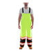 A person wearing Tingley Icon Class E Hi-Vis yellow overalls with black cuffs.