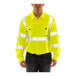 A man wearing a Tingley Hi-Vis lime safety shirt.