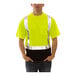 A man wearing a Tingley hi-vis lime safety shirt with black accents.