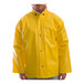 A man wearing a Tingley yellow Webdri rain jacket.