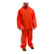 A man wearing a Tingley orange rainsuit.