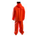 A person wearing an orange Tingley rainsuit.