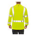 A man wearing a Tingley hi-vis yellow safety shirt with black front panel.