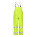 A pair of yellow Tingley Comfort-Brite overalls with reflective stripes.