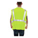 A man wearing a Tingley lime yellow safety vest.