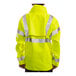 A person wearing a Tingley Hi-Vis yellow jacket.