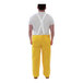 A person wearing yellow Tingley overalls.