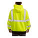 A person wearing a Tingley hi-vis lime pullover sweatshirt.