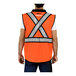 A man wearing a Tingley orange mesh safety vest with reflective X-back tape.