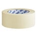 A roll of Lavex yellow masking tape with blue text.