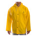 A man wearing a yellow Tingley DuraScrim rain jacket.