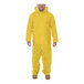 A man wearing a Tingley yellow rainsuit.