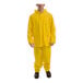 A man wearing a yellow Tingley rainsuit.