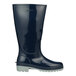 A close up of a Tingley navy waterproof boot with a rubber sole.