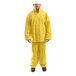 A man wearing a yellow Tingley rainsuit.