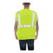 A person wearing a Tingley lime yellow mesh safety vest.