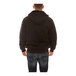 A man wearing a black Tingley zip-up sweatshirt.