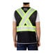 A man wearing a Tingley black mesh safety vest with reflective tape.