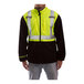 A man wearing a Tingley heavy weight yellow and black fleece jacket.