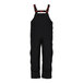 A pair of black Tingley insulated overalls with red straps.
