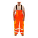 Tingley orange and black safety overalls with reflective stripes worn by a person.