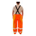 Tingley orange and black overalls with black straps.