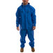 A man wearing a blue Tingley rainsuit.