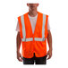 A man wearing a Tingley hi-vis orange safety vest with reflective stripes.