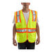 A man wearing a Tingley lime yellow safety vest.