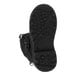 A close-up of a pair of black Tingley Winter-Tuff ice traction overshoes.