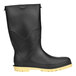 A black rubber Tingley StormTracks rain boot with a yellow sole.