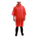 A man wearing an orange Tingley rain poncho.