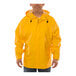 A man wearing a yellow Tingley Weather-Tuff rain jacket.