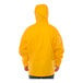 A person wearing a yellow Tingley Weather-Tuff rain jacket.