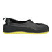 A black and yellow Tingley Workbrutes rubber overshoe with a rubber sole.