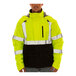 A man wearing a Tingley yellow and black industrial work jacket.