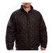 A man wearing a Tingley lime and black Bomber 3.1 jacket.