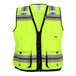 A yellow Tingley safety vest with reflective stripes and black tape.