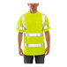 A man wearing a Tingley hi-vis lime yellow safety shirt.