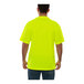 A man wearing a Tingley hi-vis lime yellow short sleeve safety shirt.