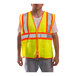 A man wearing a Tingley hi-vis lime safety vest.