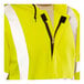 A person wearing a Tingley Hi-Vis lime yellow flame-resistant zip-up sweatshirt with a zipper.