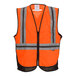 An orange Tingley safety vest with X-back reflective stripes.