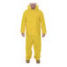 A man wearing a yellow Tingley Industrial Work rainsuit.
