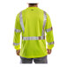 A man wearing a Tingley hi-vis yellow safety shirt with reflective stripes.