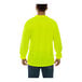 A person wearing a Tingley hi-vis lime long sleeve safety shirt.