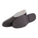 A pair of black overshoes with a white sole.