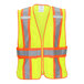 A yellow and orange Tingley Job Sight safety vest with reflective stripes.