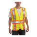 A man wearing a Tingley hi-vis yellow mesh safety vest.