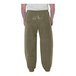 A man wearing olive green Tingley Magnaprene nylon pants.